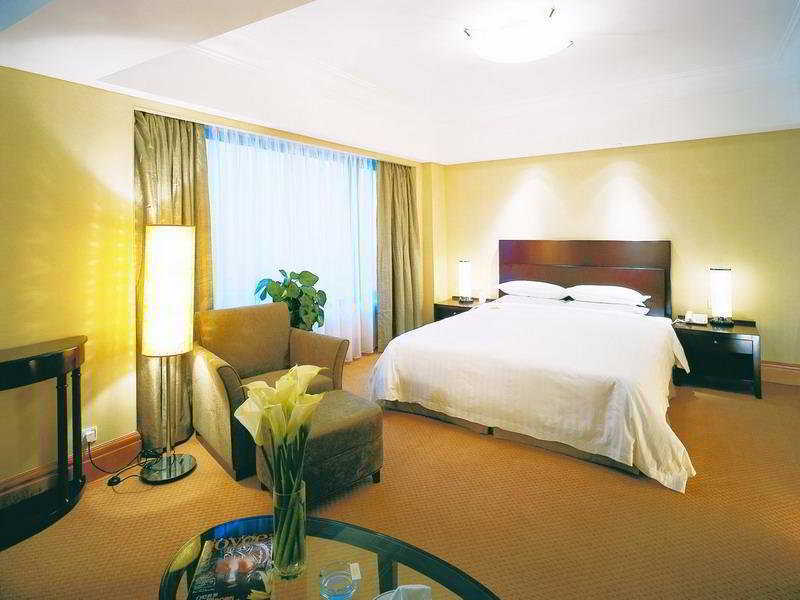 Furama Hotel Далиен Стая снимка